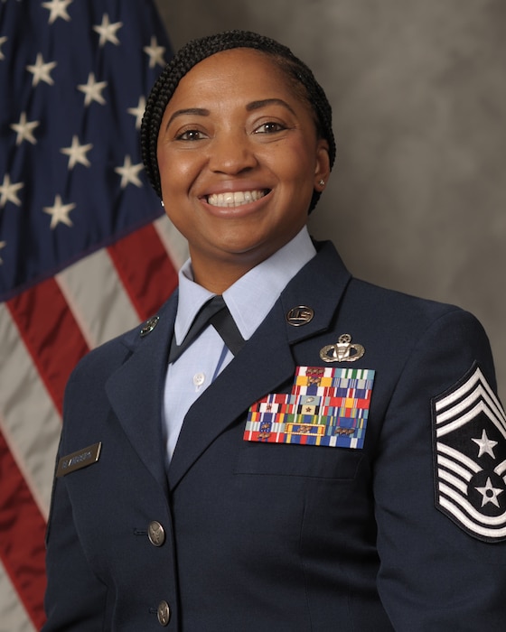 Chief Master Sgt. Cheronica Blandburg, 354th Fighter Wing command chief, poses for an official portrait.