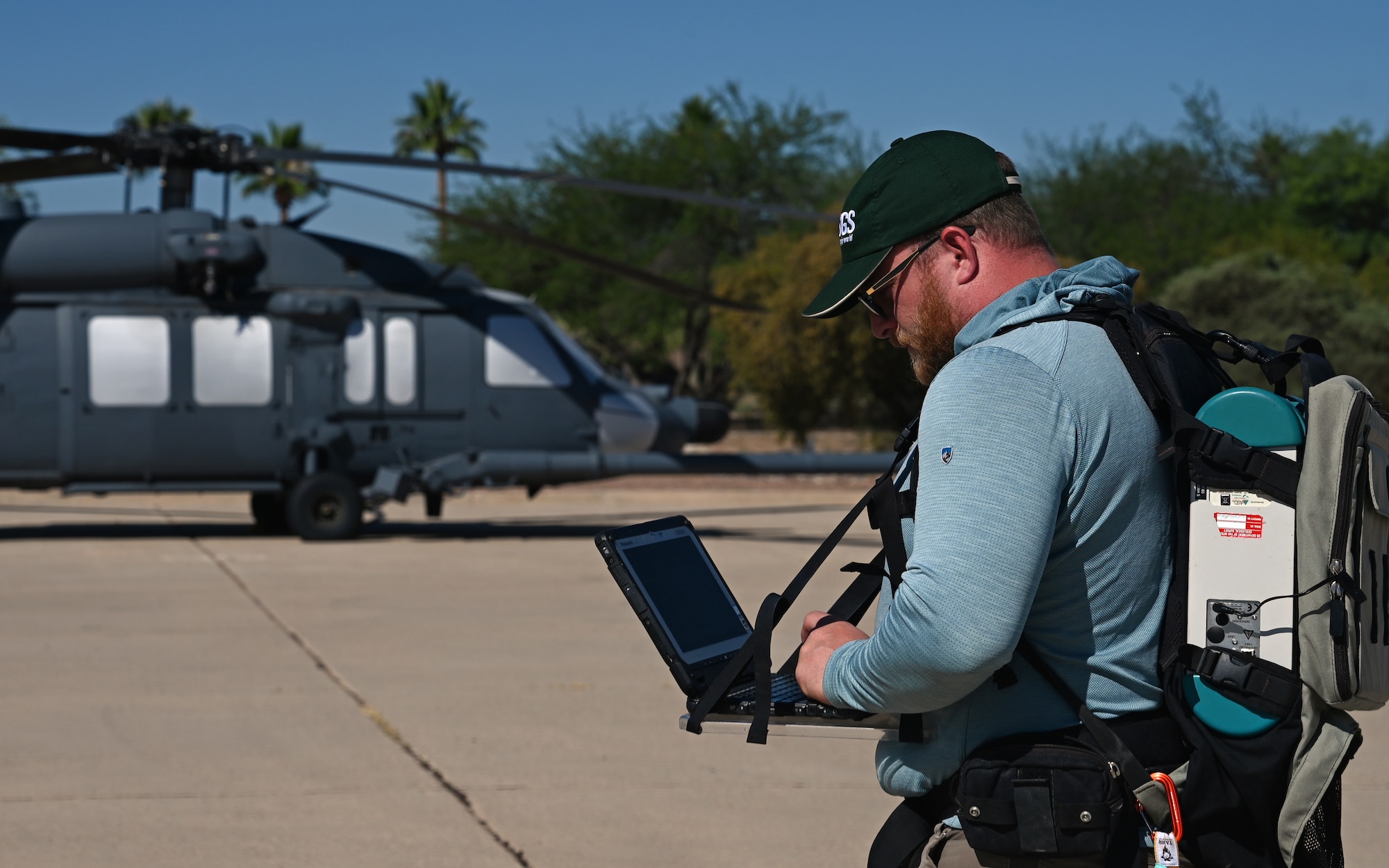 Derek Ensign, U.S. Geological Survey physical scientist, conducts hyperspectral imaging at Davis-Monthan Air Force Base, Ariz., June 11, 2024. Ensign was conducting hyperspectral imaging for the USGS Earth Mapping Resources Initiative and for sensors flown by the ER-2 to increase the nation’s geologic knowledge of critical mineral resources. (U.S. Air Force photo by Tech. Sgt. Sergio A. Gamboa)