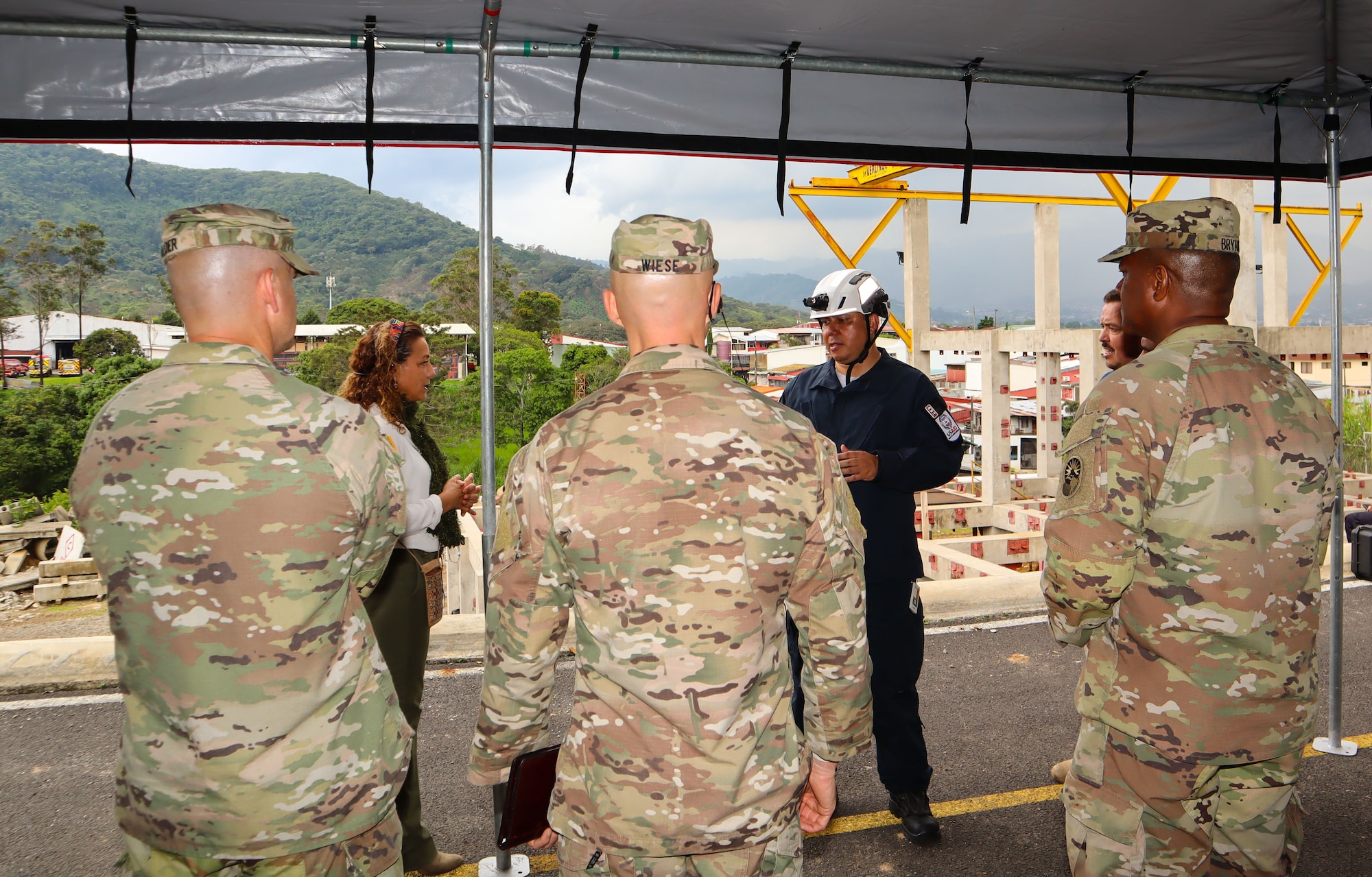 A photo of Soldiers being briefed.