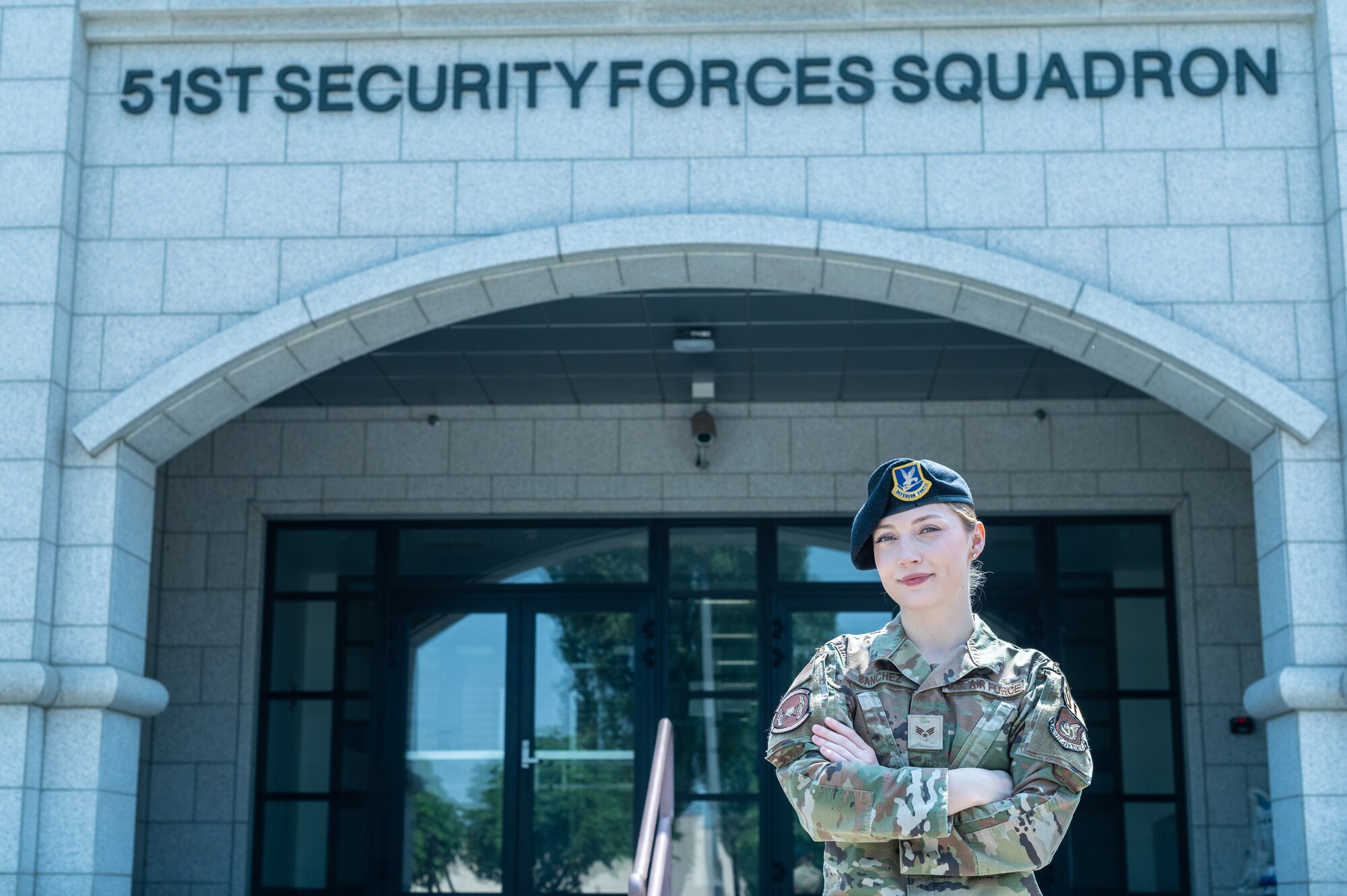 U.S. Air Force Senior Airman Hunter Sanchez, 51st Security Forces Squadron commander’s support staff supervisor, poses for a portrait at Osan Air Base, Republic of Korea, June 13, 2024. Sanchez earned the title of Mustang of the Week for her dedication to the 51st SFS. Her role is critical to maintaining mission success by ensuring over 460 members receive quality support through the administration of commander programs. (U.S. Air Force photo by Staff Sgt. Christopher Tam)