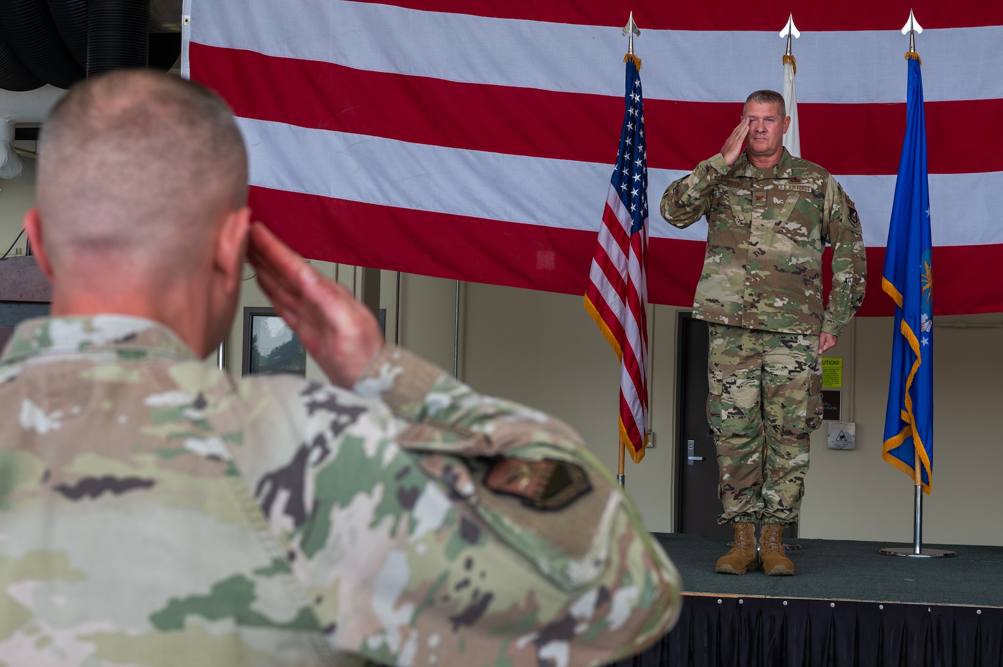 U.S. Air Force Col. Kenneth Beebe, 51st Maintenance Group commander, renders his first salute to Airmen from the 51st MXG during a change of command ceremony at Osan Air Base, Republic of Korea, June 12, 2024. The 51st MXG is responsible for providing combat-ready aircraft for the U.S. Air Force's most forward deployed permanently based fighter wing. (U.S. Air Force photo by Airman 1st Class Chase Verzaal)