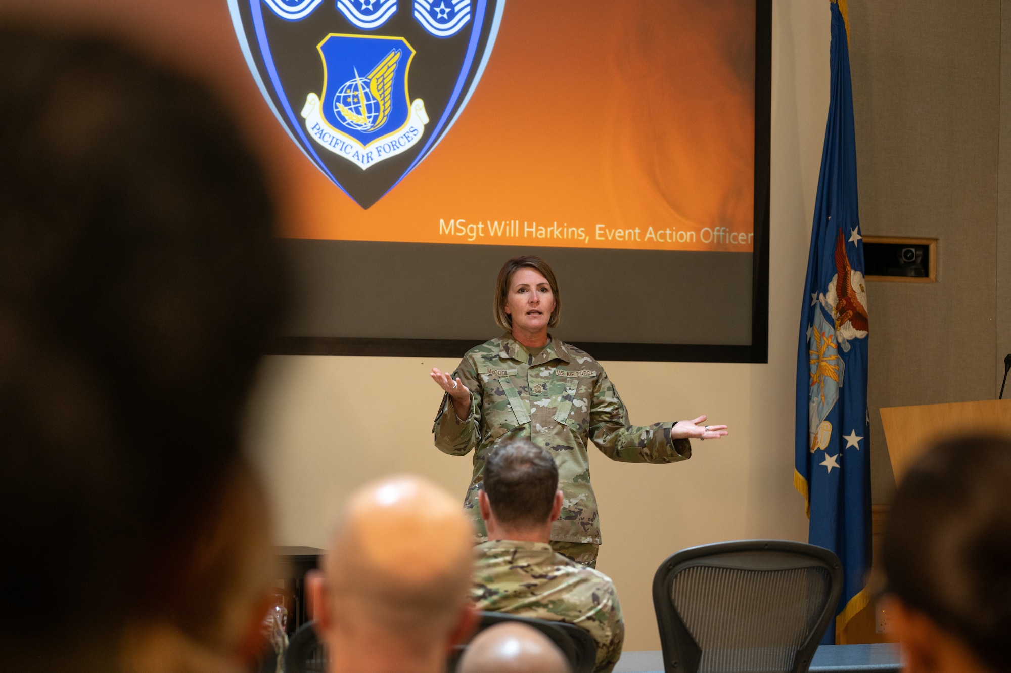 Chief Master Sgt Kathleen McCool, Command Chief, Pacific Air Forces, provides opening remarks at Pacific Paladin, a senior non-commissioned officer development seminar, at Joint Base Pearl Harbor-Hickam, Hawaii, June 10, 2024. The seminar focuses on equipping SNCOs with essential leadership skills and professional development tools.