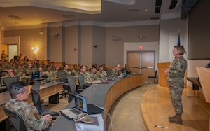 Chief Master Sgt Kathleen McCool, Command Chief, Pacific Air Forces, provides opening remarks at Pacific Paladin, a senior non-commissioned officer development seminar, at Joint Base Pearl Harbor-Hickam, Hawaii, June 10, 2024. The seminar aims to equip SNCOs with essential leadership tools and includes the newly introduced PACAF SNCO Leadership Course. (U.S. Air Force photo by Master Sgt. Eric E. Flores)