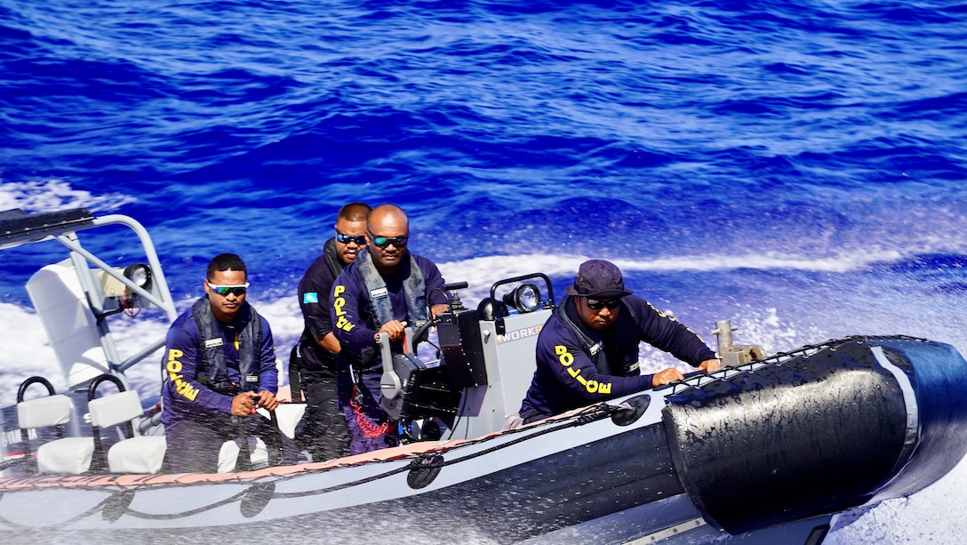 A team from the Republic of Palau practices approaches to the ship to run mock law enforcement boardings simulating coming aboard fishing vessels to ensure compliance with their nation’s regulations while offshore Guam on June 5, 2024, to build proficiency and exchange best practices. Participants from the Guardian-class patrol ships PSS President HI Remeliik II (001) from the Republic of Palau and FSS Bethwel Henry (P902) from the Federated States of Micronesia, the Forum-class RMIS Lomor (03) from the Republic of the Marshall Islands, along with members from the USCGC Oliver Henry (WPC 1140), USCGC Frederick Hatch (WPC 1143), U.S. Coast Guard Forces Micronesia, and U.S. Coast Guard Base Guam team, showcased their skills. The event, part of the inaugural Operation Irensia, was held with partners from the Royal Australian Navy and Australian Defence Force Pacific Maritime Security Program, highlighting the collaborative spirit and enhanced interoperability among Pacific allies from June 3-9, 2024. (U.S. Coast Guard photo by Chief Warrant Officer Sara Muir)