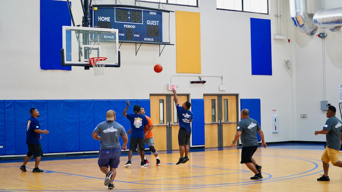 Teams demonstrate their prowess in friendly basketball games on June 5, 2024, at the Charles King Fitness Center on Naval Base Guam to build camaraderie. Participants from the Guardian-class patrol ships PSS President HI Remeliik II (001) from the Republic of Palau and FSS Bethwel Henry (P902) from the Federated States of Micronesia, the Forum-class RMIS Lomor (03) from the Republic of the Marshall Islands, along with members from the USCGC Oliver Henry (WPC 1140), U.S. Coast Guard Forces Micronesia, and U.S. Coast Guard Base Guam team, showcased their skills. The event, part of the inaugural Operation Irensia, was held with partners from the Royal Australian Navy and Australian Defence Force Pacific Maritime Security Program, highlighting the collaborative spirit and enhanced interoperability among Pacific allies from June 3-9, 2024. (U.S. Coast Guard photo by Lt. Drew Lovullo)