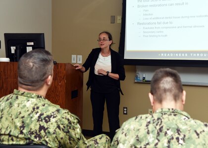 JOINT BASE SAN ANTONIO-FORT SAM HOUSTON – (June 13, 2024) – Dr. Sabrina Snyder, a research scientist, assigned to Craniofacial Health and Restorative Medicine Directorate, Naval Medical Research Unit (NAMRU) San Antonio, presented research on the advance development of a self-healing dental composite during the ninth edition of Mission Possible, an information-sharing event, held at the Tri-Service Research Laboratory. The purpose of Mission Possible is to better inform members of the command on the tactics, techniques, and procedures of the science directorates to include the resource acquisitions and administrative directorates. NAMRU San Antonio’s mission is to conduct gap driven combat casualty care, craniofacial, and directed energy research to improve survival, operational readiness, and safety of Department of Defense (DoD) personnel engaged in routine and expeditionary operations. It is one of the leading research and development laboratories for the U.S. Navy under the DoD and is one of eight subordinate research commands in the global network of laboratories operating under the Naval Medical Research Command in Silver Spring, Md. (U.S. Navy photo by Burrell Parmer, NAMRU San Antonio Public Affairs/Released)
