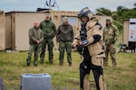 PUTLOS, Germany (June 11, 2024) - U.S. Navy Explosive Ordnance Disposal (EOD) technicians assigned to Explosive Ordnance Disposal Mobile Unit (EODMU) 2 and Royal Netherlands Navy maritime EOD technicians share knowledge on render safe techniques for improvised explosive devices (IEDs) in support of Baltic Operations (BALTOPS) 24, Putlos, Germany, June 11, 2024. BALTOPS 24 is the premier maritime-focused exercise in the Baltic region. The exercise, led by U.S. Naval Forces Europe-Africa and executed by Naval Striking and Support Forces NATO, provides a unique training opportunity to strengthen combined response capabilities critical to preserving freedom of navigation and security in the Baltic Sea. (U.S. Navy Photo by Mass Communication Specialist 2nd Class Jackson Adkins)