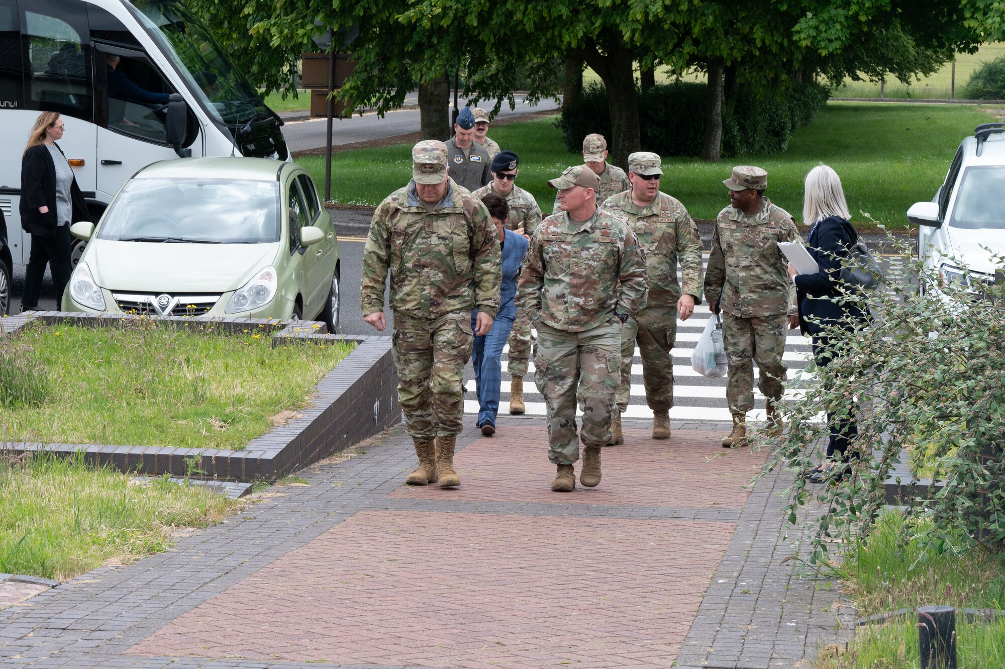 U.S. Air Force Maj. Gen. John J. Allen Jr., Air Force Installation and Mission Support Center commander, left, walks with Col. Landon D. Phillips, 501st Combat Support Wing commander on RAF Fairford.
