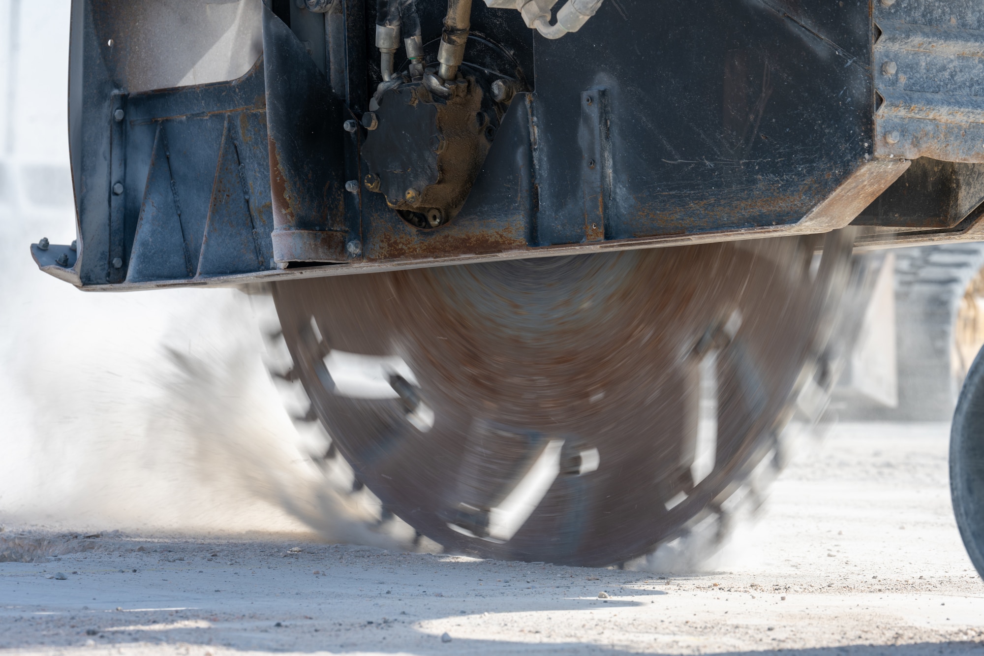 Pavement and construction equipment specialists assigned to the 379th Expeditionary Civil Engineer Squadron enlarge a simulated crater in an airfield at an undisclosed location within the U.S. Central Command area of responsibility, June 12, 2024.