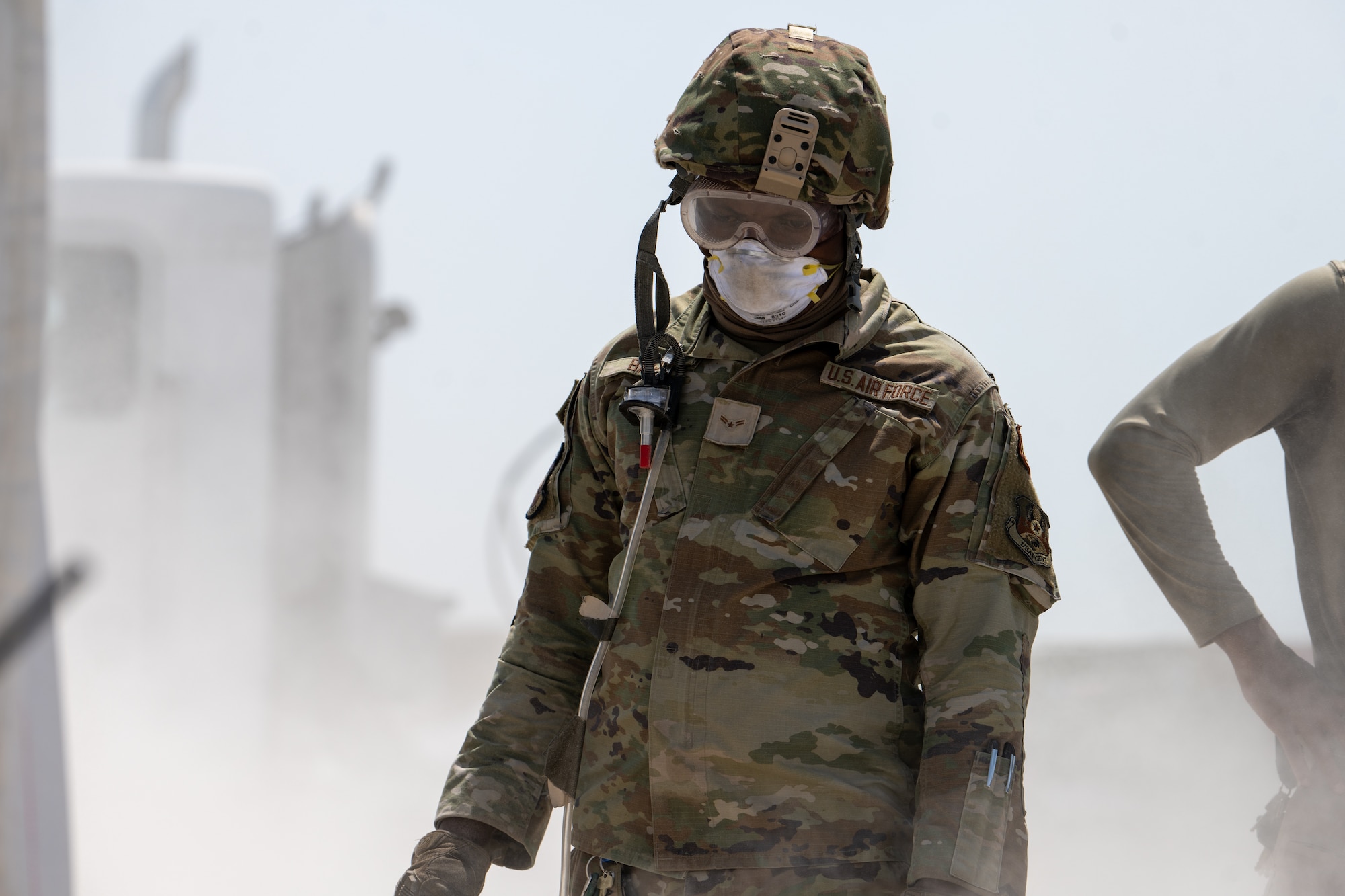 An Airman assigned to the 379th Expeditionary Civil Engineer Squadron participates in a Rapid Airfield Damage Repair exercise at an undisclosed location in the U.S. Central Command area of responsibility, June 12, 2024.