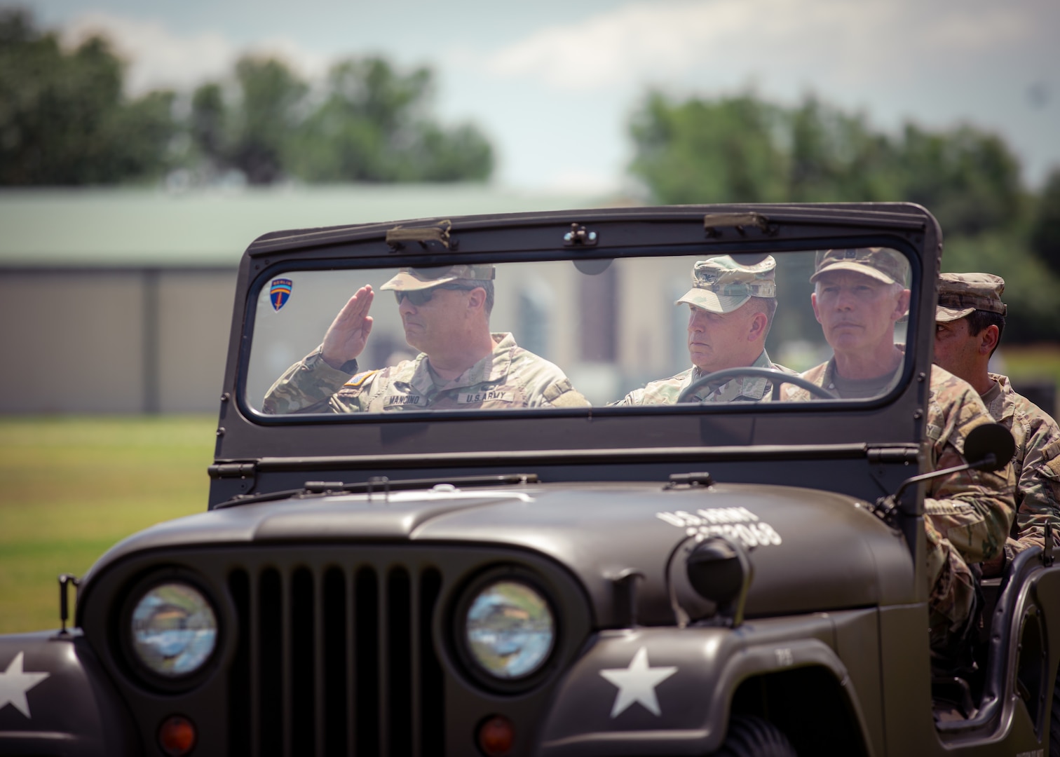 (From left) Maj. Gen. Thomas H. Mancino, adjutant general for Oklahoma, Col. Andrew Ballengr, outgoing commander of the 45th Infantry Brigade Combat Team, Sgt. Maj. Joe Van Ausdall, operations sergeant major for the 45th IBCT, and Col. Khalid Hussein, incoming commander of the 45th IBCT, Oklahoma Army National Guard, conduct an inspection of ranks during a change of command ceremony held at Camp Gruber Training Center near Braggs, Oklahoma, June 11, 2024. Ballenger commanded the 45th IBCT since August 2022, leading the brigade through numerous deployments and training exercises, enhancing its readiness and operational capabilities. (Oklahoma National Guard photo by Cpl. Danielle Rayon)