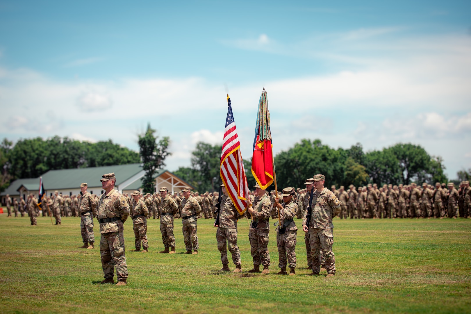 Members of the 45th Infantry Brigade Combat Team, Oklahoma Army National Guard, stand in formation during a change of command ceremony between Col. Andrew Ballenger, outgoing commander, and Col. Khalid Hussein, incoming commander, at Camp Gruber Training Center near Braggs, Oklahoma, June 11, 2024.   Ballenger commanded the 45th IBCT since August 2022, leading the brigade through numerous deployments and training exercises, enhancing its readiness and operational capabilities. (Oklahoma National Guard photo by Cpl. Danielle Rayon)