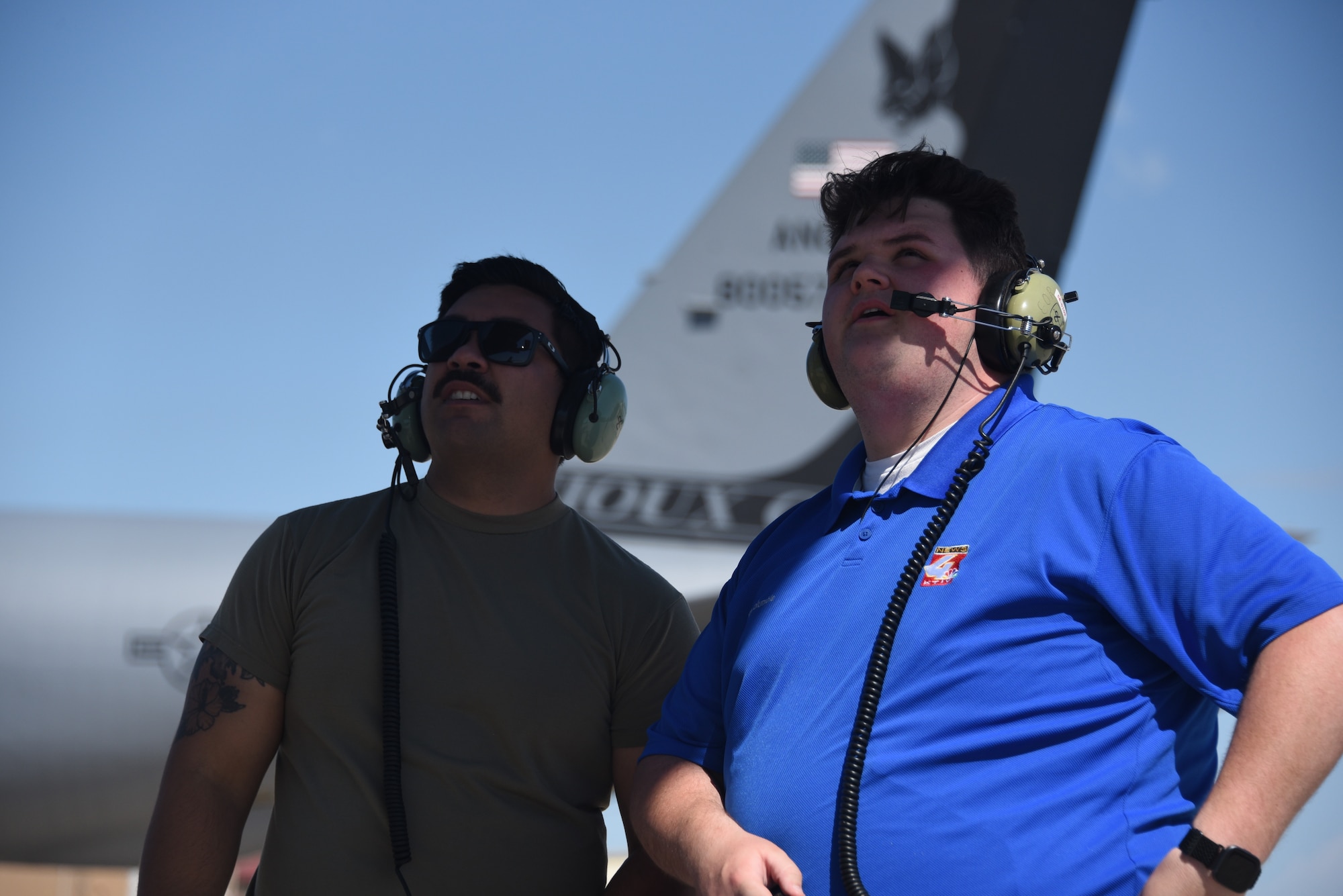 185th ARW Crew Chief, Staff Sgt. Jay Smith shows KTIV Meteorologist, Jacob Howard a KC-135 Stratotanker.