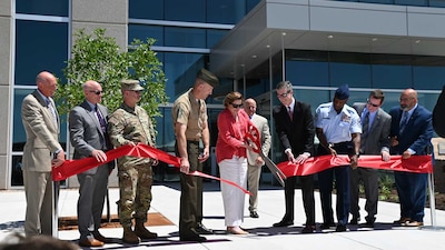 The Defense Threat Reduction Agency’s Albuquerque Office (DTRA-ABQ) hosted a ribbon-cutting ceremony Wednesday, June 12, 2024, for the agency’s new multi-use building on Kirtland Air Force Base. The 76,000 square foot facility will be home to more than 300 U.S. military personnel and DoD civilians and includes unclassified and classified workspaces and meeting rooms, administrative offices, and a seismic laboratory.