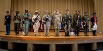 Soldiers wearing different Army Uniforms