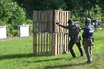 U.S. Marshals conduct training on a firing range at Fort Indiantown Gap, Pa., June 12, 2024. About 30 U.S. Marshals from around the country conducted training on high-stress scenarios at Fort Indiantown Gap June 3 to 13. (Pennsylvania National Guard photo by Brad Rhen)