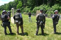 U.S. Marshals conduct training on a firing range at Fort Indiantown Gap, Pa., June 12, 2024. About 30 U.S. Marshals from around the country conducted training on high-stress scenarios at Fort Indiantown Gap June 3 to 13. (Pennsylvania National Guard photo by Brad Rhen)