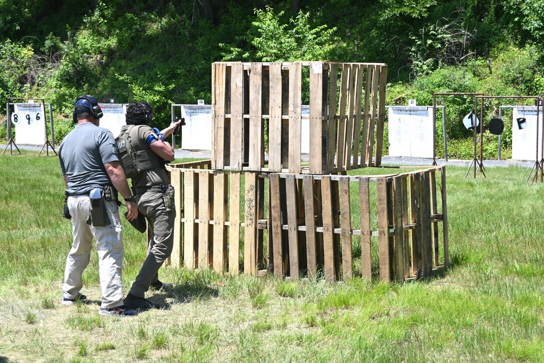 U.S. Marshals conduct training on a firing range at Fort Indiantown Gap, Pa., June 12, 2024. About 30 U.S. Marshals from around the country conducted training on high-stress scenarios at Fort Indiantown Gap June 3 to 13. (Pennsylvania National Guard photo by Brad Rhen)