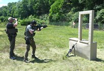 U.S. Marshals conduct training at a firing range at Fort Indiantown Gap, Pa., June 12, 2024. About 30 U.S. Marshals from around the country conducted training on high-stress scenarios at Fort Indiantown Gap June 3 to 13. (Pennsylvania National Guard photo by Brad Rhen)