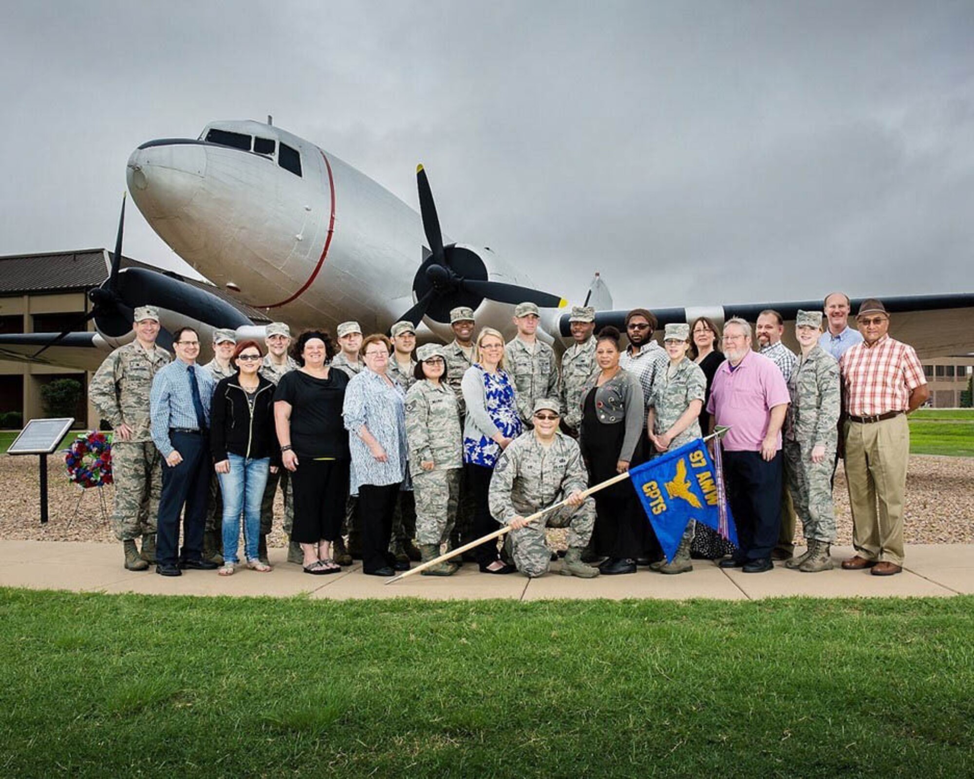 Airmen from the 97th Comptroller Squadron (CPTS) pose for a photo at Altus Air Force Base, Oklahoma, Aug. 15, 2015. The 97th CPTS is responsible for military, civilian, and travel pay. (courtesy photo by Mark Patterson)