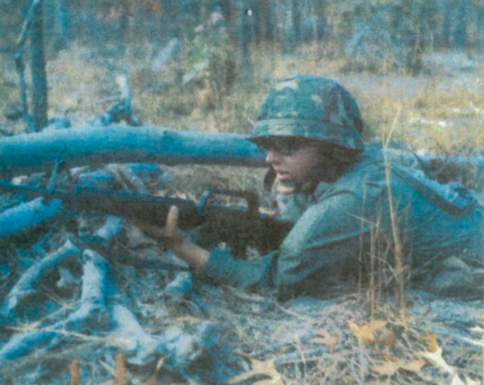 U.S. Army Pvt. Mark Patterson, basic trainee, practices firing an M16 rifle during bivouac at Fort Jackson, South Carolina, Nov. 15, 1978. Bivouac is a patrol base operation that prepares soldiers for field training. (courtesy photo by Mark Patterson)