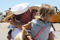 240529-N-GA645-1137 NAVAL STATION ROTA, Spain (May 29, 2024) Sailors reunite with
their family after the return of Arleigh Burke-class guided-missile destroyer USS Arleigh Burke
(DDG 51) to Naval Station Rota, May 29, 2024. Arleigh Burke, forward-deployed to Rota, is on
a scheduled patrol in the U.S. Sixth Fleet area of operations in support of U.S. national security
interests in Europe and Africa. (U.S. Navy photo by Courtney Pollock)