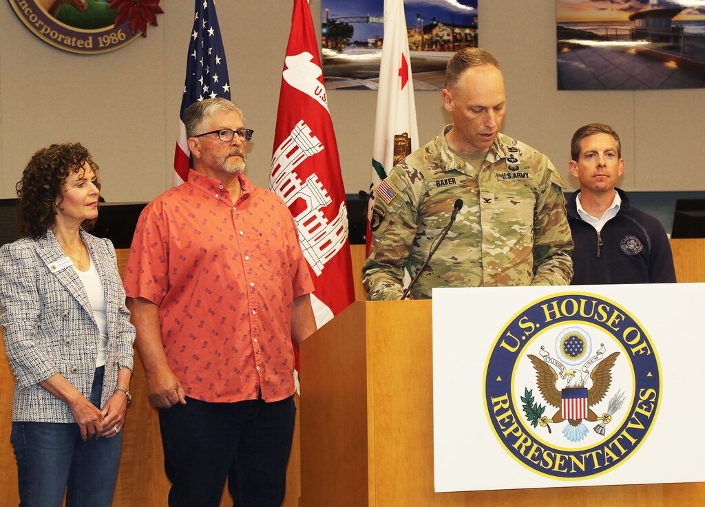 Col. Andrew Baker, U.S. Army Corps of Engineers Los Angeles District commander, speaks to the media during a May 13 press conference, while, from left to right, Solana Beach Mayor Lesa Heebner, Encinitas Mayor Tony Kranz and Rep. Mike Levin with California’s 49th District, look on at Encinitas City Hall in Encinitas, California.