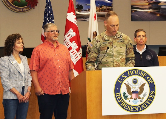 Col. Andrew Baker, U.S. Army Corps of Engineers Los Angeles District commander, speaks to the media during a May 13 press conference, while, from left to right, Solana Beach Mayor Lesa Heebner, Encinitas Mayor Tony Kranz and Rep. Mike Levin with California’s 49th District, look on at Encinitas City Hall in Encinitas, California.