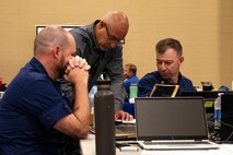 Men speaking together