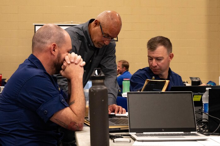 Men speaking together