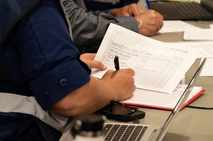 Person Writing on paper