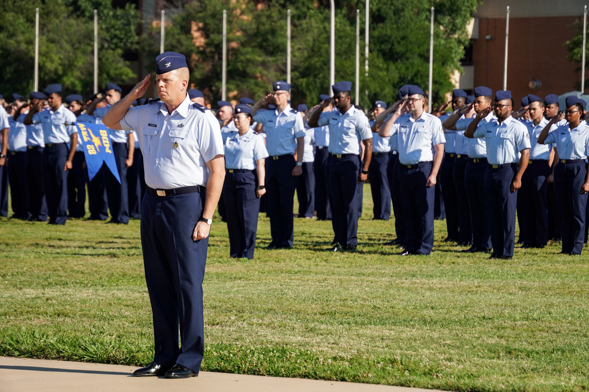 Airmen render a salute