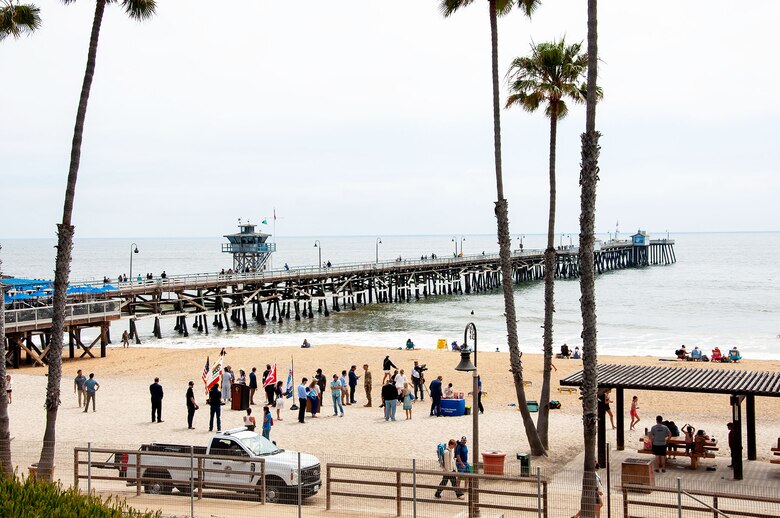 Community members and representatives from various city, state and federal agencies attend a ribbon-cutting ceremony to celebrate the completion of Phase One of the San Clemente Beach Nourishment project May 31 in San Clemente, Calif. As part of the project, re-nourishment will occur every six years, on average, for eight additional nourishments.