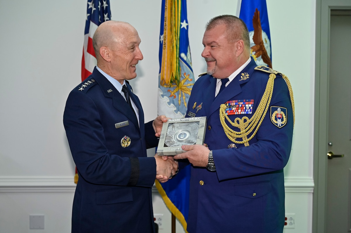 Air Force Chief of Staff Gen. David Allvin, left, presents a gift to Slovak Air Force Commander Maj. Gen. Róbert Tóth, right, during a meeting at the Pentagon in Arlington, Va., June 11, 2024. During this meeting, Allvin congratulated Slovakia on its 20-year anniversary as a member of NATO, noting Slovakia’s steadfast commitment to the Alliance and its vital role in maintaining peace and security in Europe (U.S. Air Force photo by Eric Dietrich).