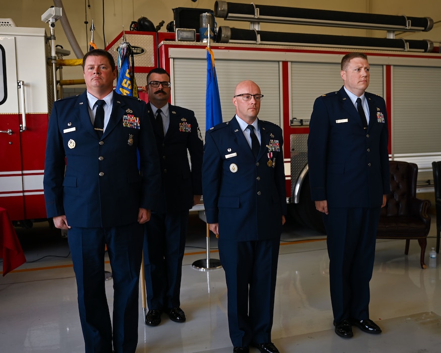 U.S. Air Force Col. Timothy Dalby, 17th Mission Support Group commander, left, Lt. Col. Joshua Carroll, outgoing 17th Civil Engineering Squadron commander, center, and Maj. Levi Beard, incoming 17th CES commander, right, stand during the 17th CES change of command ceremony at the Goodfellow Fire Department, Goodfellow Air Force Base, Texas, June 13, 2024. The mission for the 17th CES is to provide the quality facilities, infrastructure, and customer service necessary to produce fire protection and intelligence, surveillance, and reconnaissance professionals. (U.S. Air Force photo by Airman 1st Class Evelyn J. D’Errico)