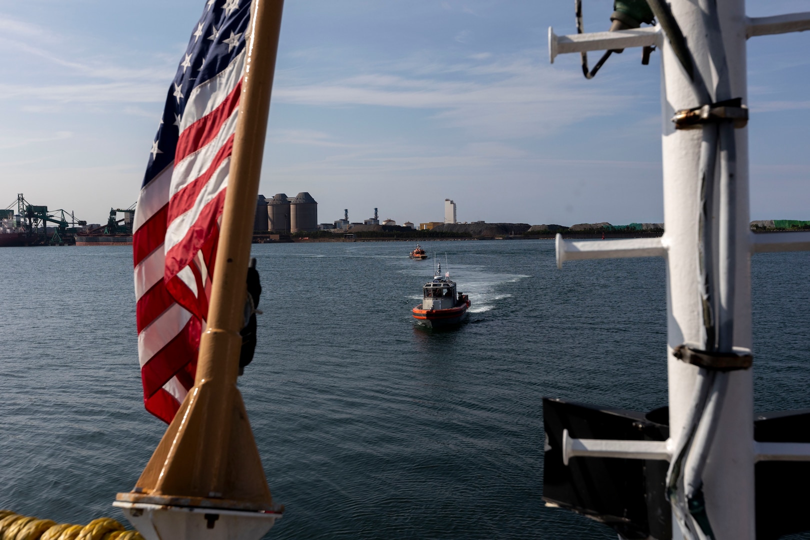 U.S. Coast Guardsmen prepare to recover a small boat aboard the U.S. Coast Guard Cutter Waesche (WMSL-751), during a ship tour of the Waesche in Pohang, Republic of Korea, June 9, 2024. U.S. Coast Guardsmen welcomed the mayor of Pohang and leaders from the Korea Coast Guard aboard for a tour to highlight capabilities and best practices used by the U.S. Coast Guard. U.S. Coast Guard missions in the Indo-Pacific focus on issues directly supporting and advancing our regional partners’ efforts to protect fish stocks, ensure safety of life at sea, support environmental response, and provide disaster relief. (U.S. Marine Corps photo by Cpl. Elijah Murphy)