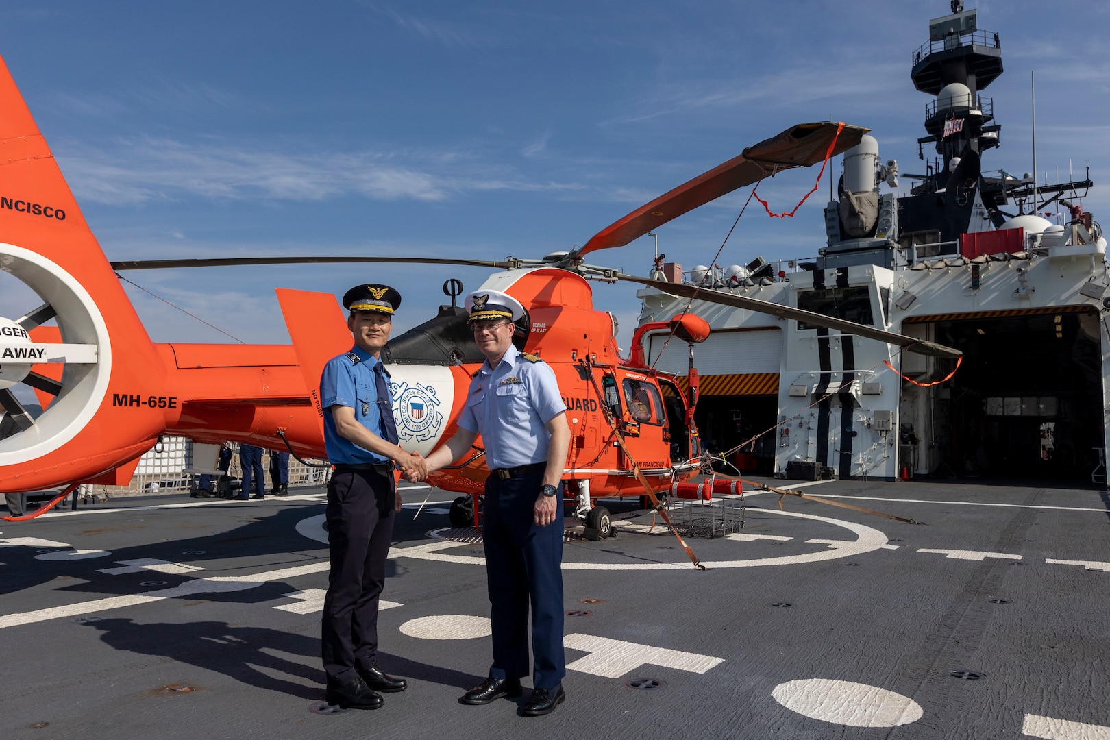 U.S. Coast Guard Capt. Tyson Scofield, commanding officer of the U.S. Coast Guard Cutter Waesche (WMSL-751), right, and Republic of Korea Coast Guard Capt. Lee Gi Bong, commanding officer of the Korea Coast Guard Patrol Vessel 1510, pose for a photo during a ship tour of the Waesche in Pohang, Republic of Korea, June 9, 2024. U.S. Coast Guardsmen welcomed the mayor of Pohang and leaders from the Korea Coast Guard aboard for a tour to highlight capabilities and best practices used by the U.S. Coast Guard. Waesche is deployed to the Indo-Pacific to advance relationships with ally and partner nations to build a more stable, free, open and resilient region with unrestricted, lawful access to the Maritime Commons. (U.S. Marine Corps photo by Cpl. Elijah Murphy)