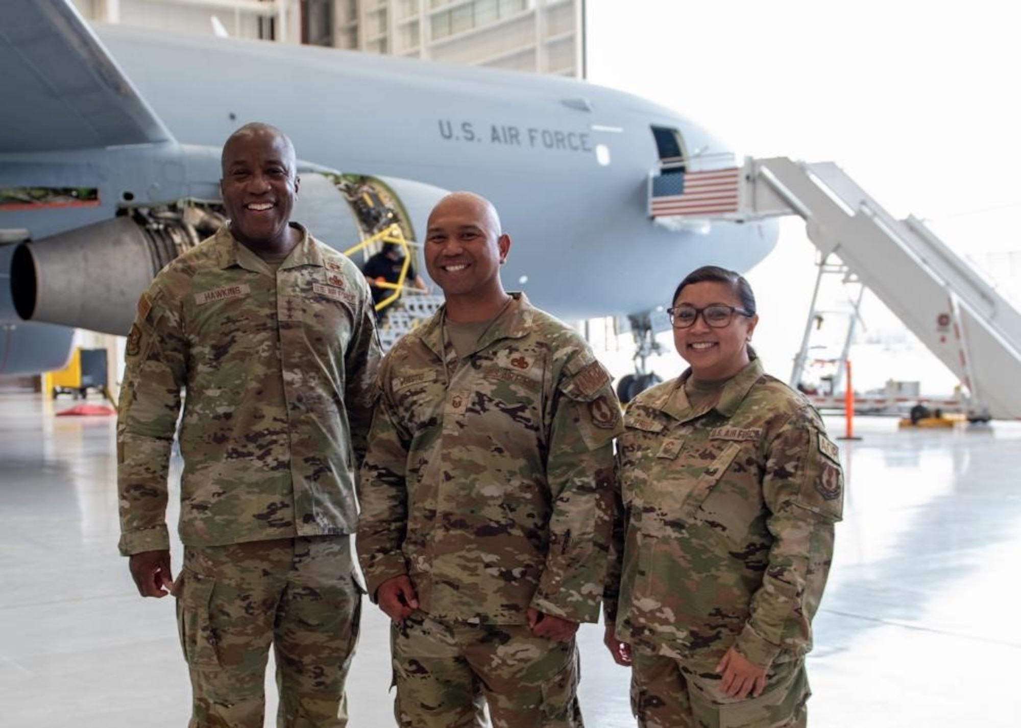 people standing in front of aircraft