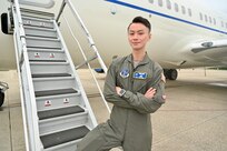 Tech. Sgt. Lang Xiao, flight attendant, D.C. Air National Guard, stands for a photograph in front of a C-40 B/C used to transport members of the Executive Branch, Congress, and Department of Defense at Joint Base Andrews, Md., May 19, 2024. The former communication designer embraces the challenge each new mission brings as a D.C. Air National Guard flight attendant to include a strong a desire for international travel.