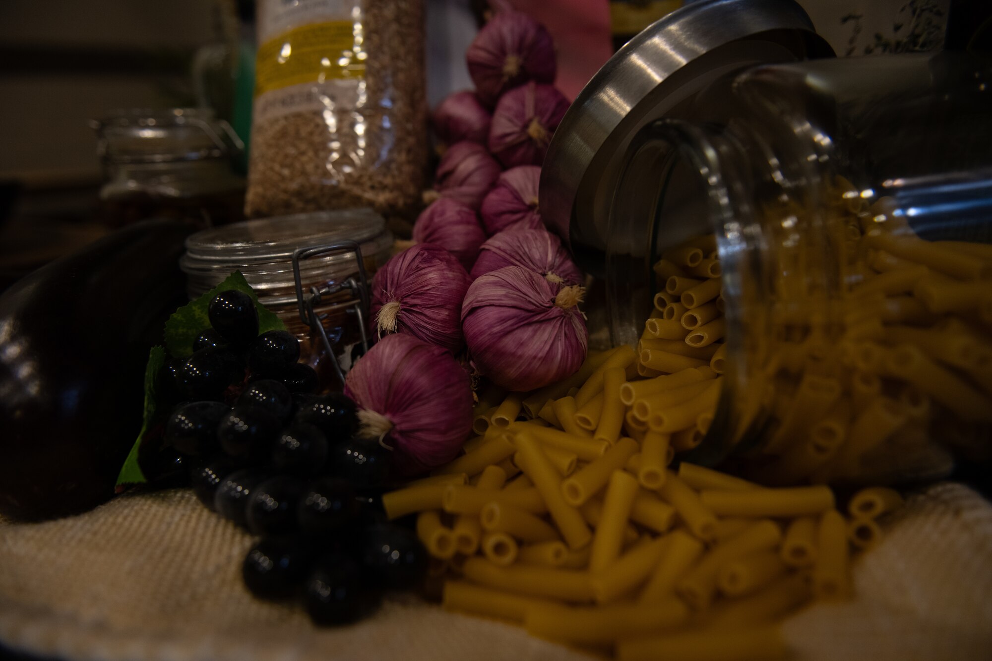 Italian ingredients rest on counter.