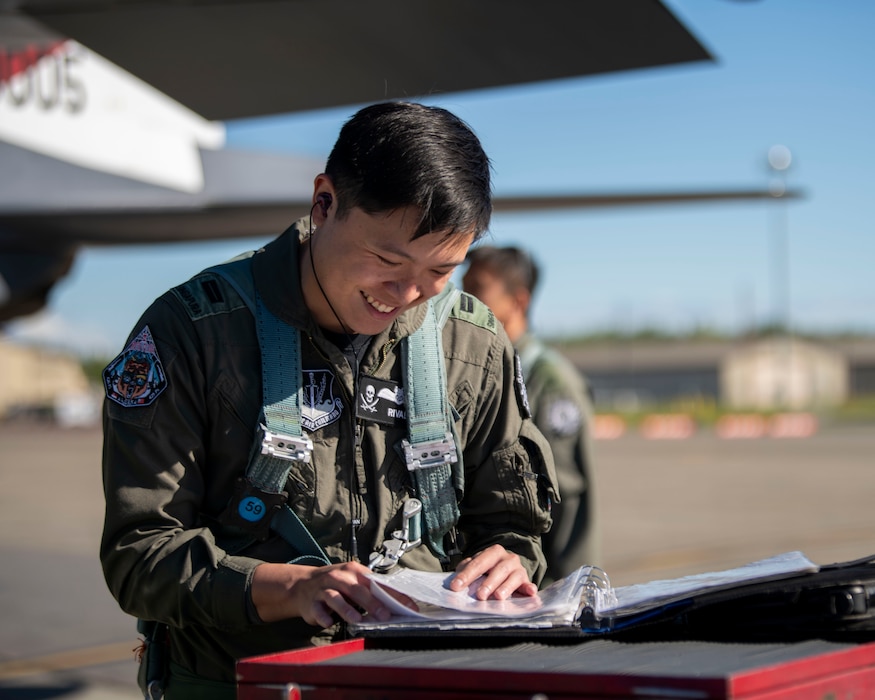 Republic of Singapore Air Force Lt. Damien Lee, 428th Fighter Squadron pilot, conducts pre-flight checks during Red Flag-Alaska 24-2.