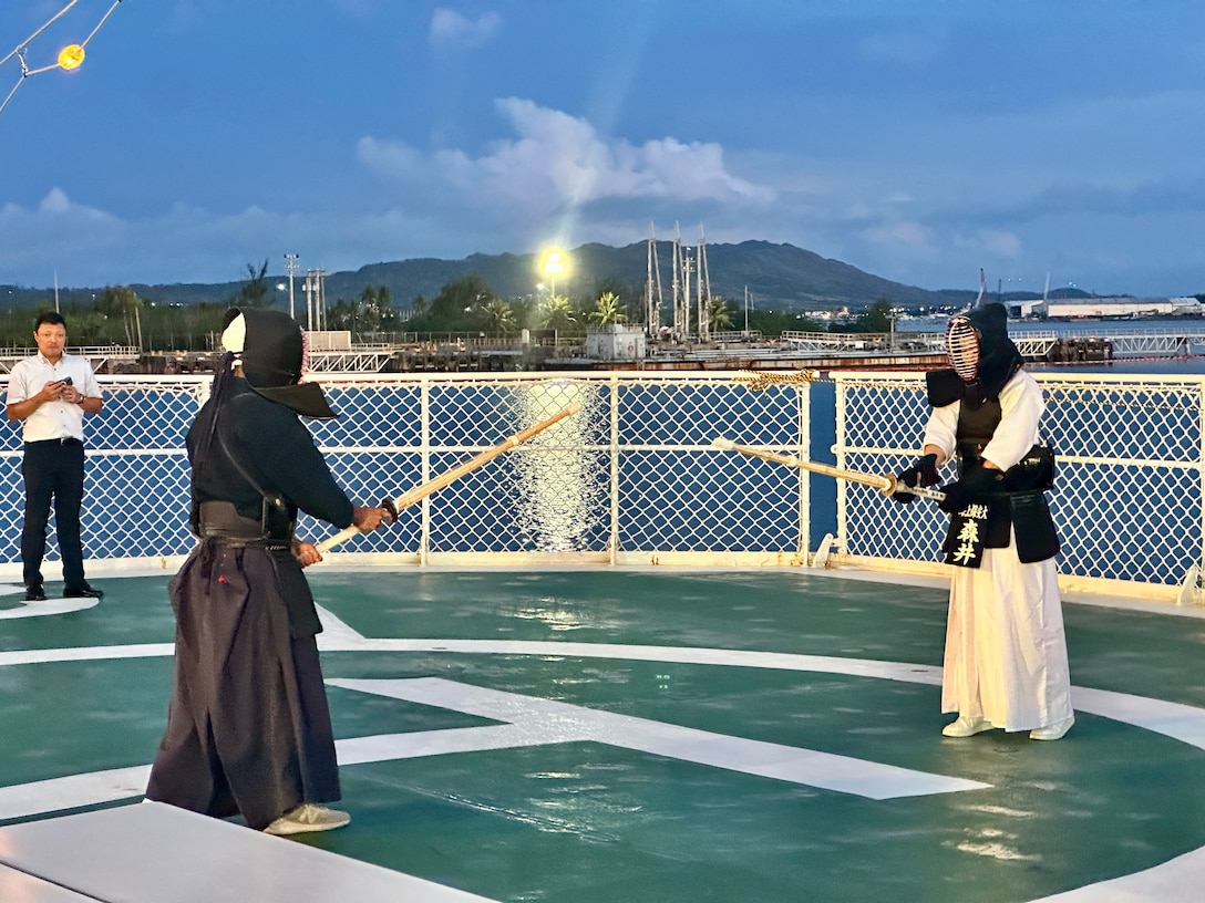 Cadets aboard the Japanese Coast Guard training ship Kojima give a cultural demonstration during their visit to Guam on June 12, 2024. During the visit, three U.S. Coast Guard Academy cadets had the unique opportunity to share their recent experience of joining their Japanese counterparts on the voyage to Guam. This journey created lasting memories and built strong professional relationships. (U.S. Coast Guard photo by Chief Warrant Officer Sara Muir)