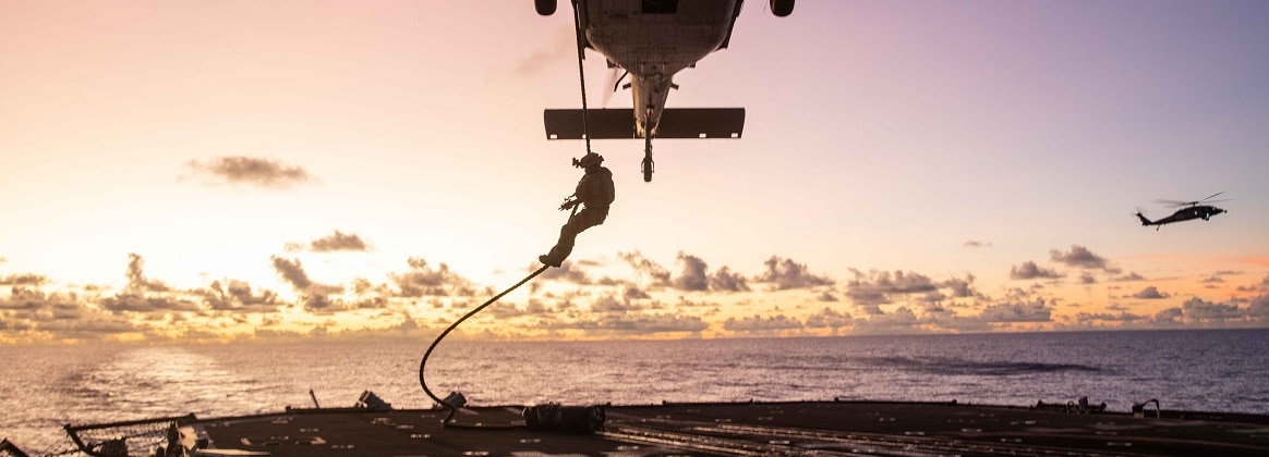 Sailors assigned to Explosive Ordnance Disposal Mobile Unit (EODMU) 5 conduct fast-rope and rappel training from an MH-60S Seahawk Helicopter.