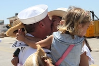 240529-N-GA645-1137 NAVAL STATION ROTA, Spain (May 29, 2024) Sailors reunite with
their family after the return of Arleigh Burke-class guided-missile destroyer USS Arleigh Burke
(DDG 51) to Naval Station Rota, May 29, 2024. Arleigh Burke, forward-deployed to Rota, is on
a scheduled patrol in the U.S. Sixth Fleet area of operations in support of U.S. national security
interests in Europe and Africa. (U.S. Navy photo by Courtney Pollock)