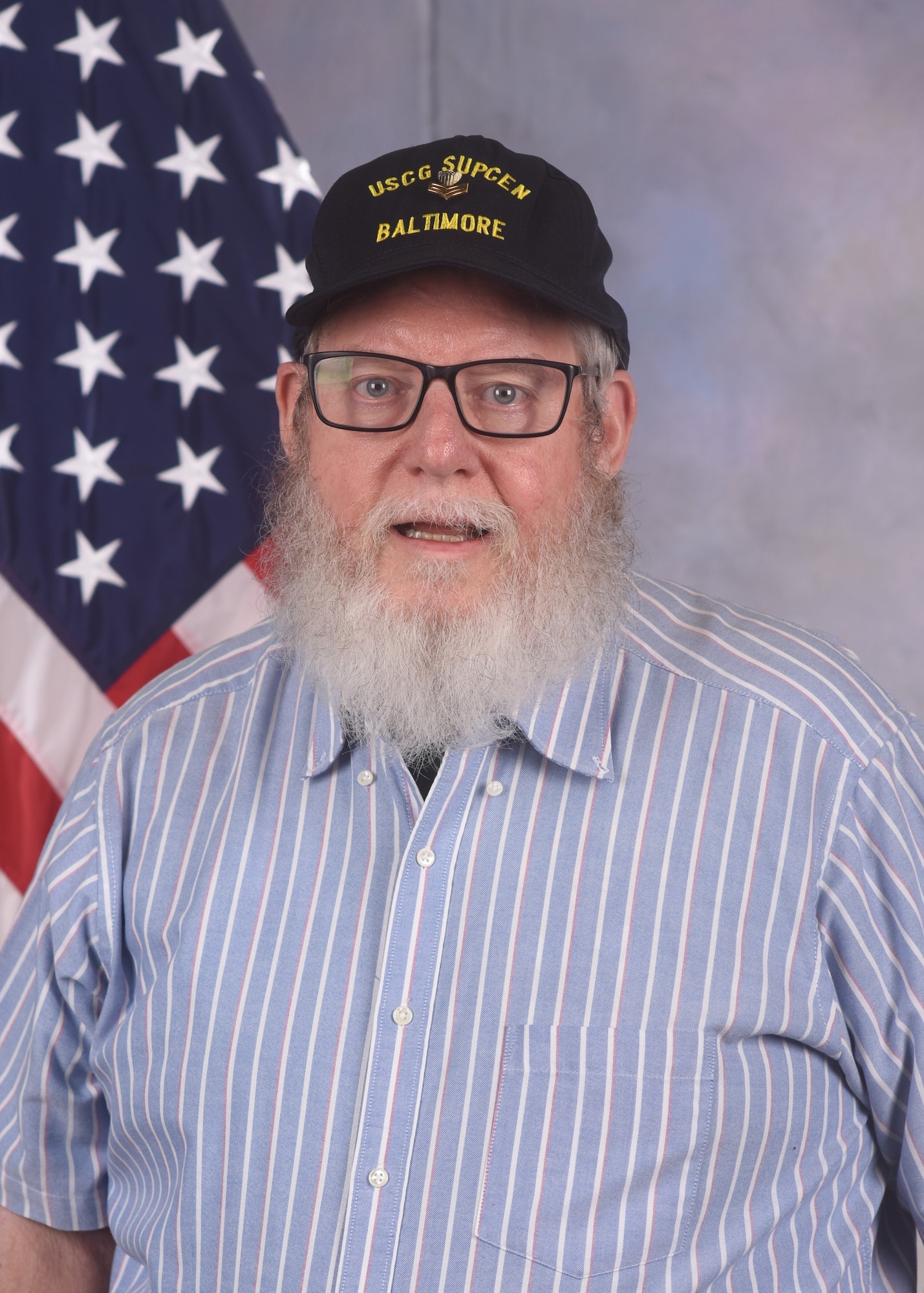 Mark Patterson, 97th Comptroller Squadron budget analyst, poses for a photo at Altus Air Force Base, Oklahoma, June 7, 2024. Patterson will be retiring after forty-two years of combined service in the Army, Coast Guard, and civil service. (U.S. Air Force photo by Senior Airman Miyah Gray)