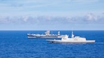 240614-N-PH222-1064
PHILIPPINE SEA (June 14, 2024) - U.S. Navy 7th Fleet Flagship USS Blue Ridge (LCC 19), left, conducts a maneuvering exercise with the French Navy Aquitaine-class frigate FS Bretagne (D 655) in the Philippine Sea during Valiant Shield 2024, June 14, 2024. Exercises such as Valiant Shield allow the Indo-Pacific Command Joint Forces the opportunity to integrate forces from all branches of services and with our allies to conduct precise, overwhelming multi-axis, multi-domain effects that demonstrate the strength and versatility of the Joint Force and our commitment to a free and open Indo-Pacific. U.S. 7th Fleet is the U.S. Navy’s largest forward-deployed numbered fleet, and routinely interacts and operates with allies and partners to preserve a free and open Indo-Pacific. (U.S. Navy photo by Mass Communication Specialist 1st Class Ryan M. Breeden)