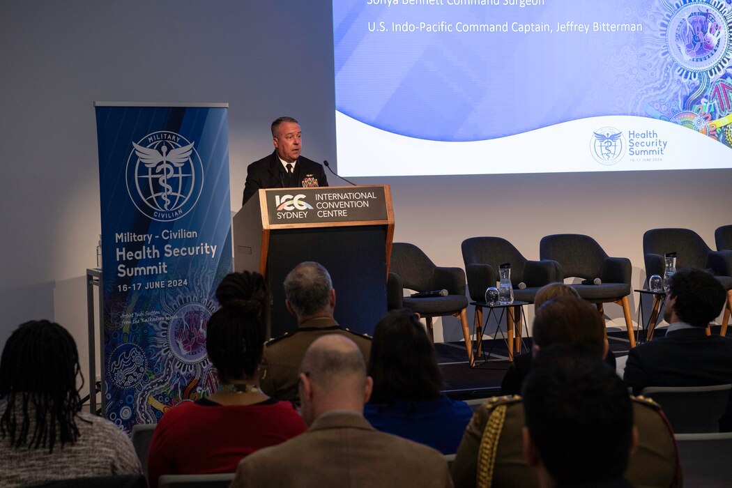 U.S. Navy Capt. Jeffery Bitterman, command surgeon at U.S. Indo-Pacific Command, gives opening remarks to the Military Civilian Health Security Summit co-hosted by the Australian Defence Force, U.S. Indo-Pacific Command, and the Defense Threat Reduction Agency in Sydney, June 16, 2024.