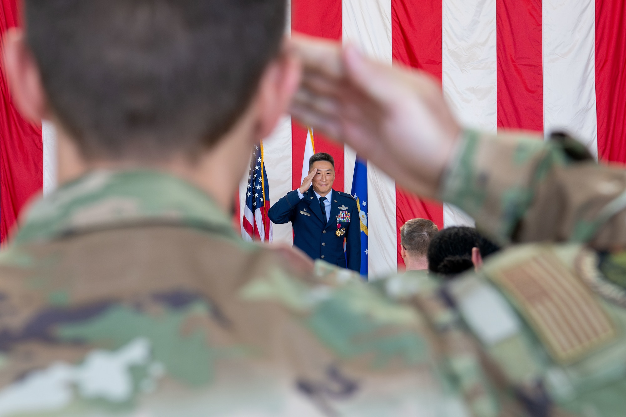 Airmen and civilians at a formal ceremony