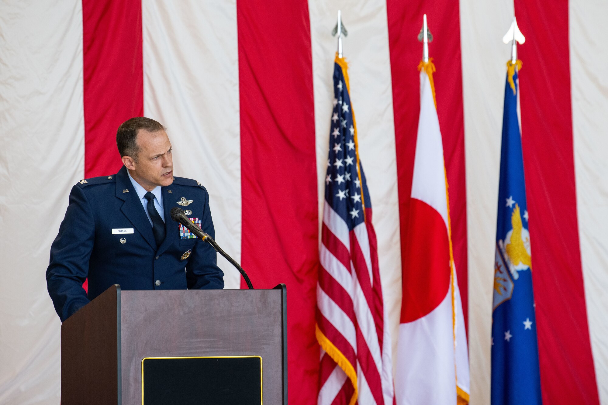 Airmen and civilians at a formal ceremony