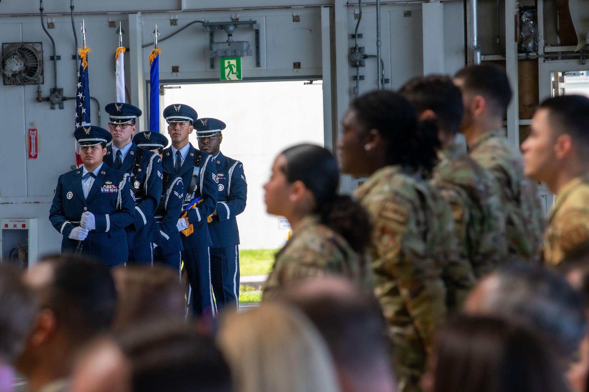 Airmen and civilians at a formal ceremony